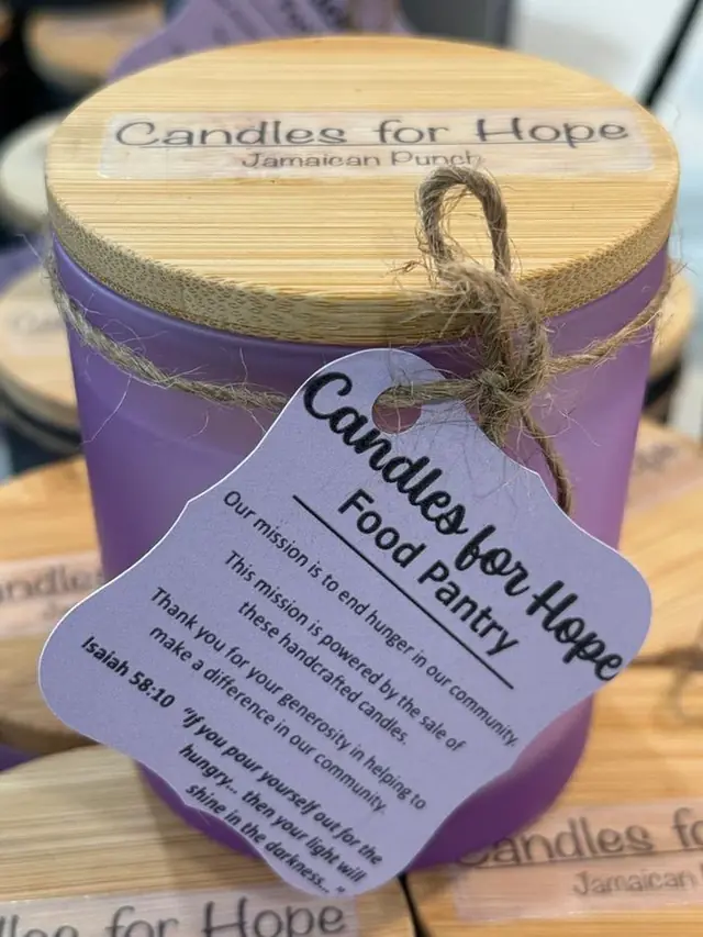 Jamaican Punch candle in a frosted purple jar with a bamboo lid, tied with twine and a Candles for Hope tag