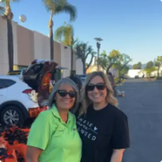 Two volunteers at a community distribution event